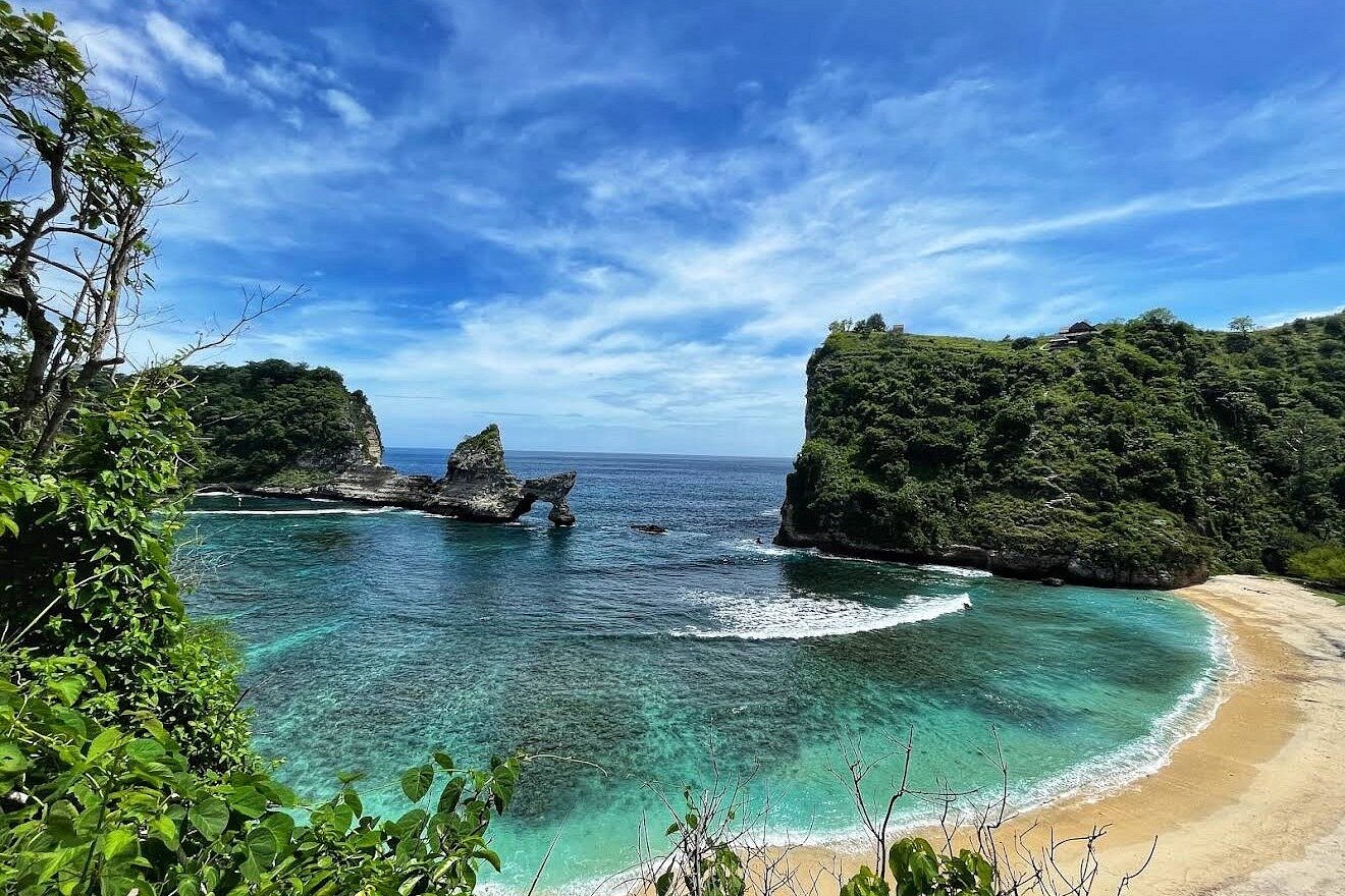 Atuh Beach with turquoise water framed by limestone cliffs